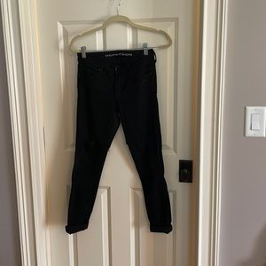 Distressed black denim